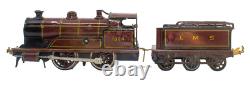 1915's Bing LMS Continental Clockwork 0-gauge Train Set with Continental Cars