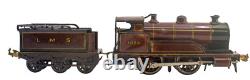 1915's Bing LMS Continental Clockwork 0-gauge Train Set with Continental Cars