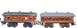 1915's Bing LMS Continental Clockwork 0-gauge Train Set with Continental Cars