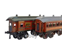 1915's Bing LMS Continental Clockwork 0-gauge Train Set with Continental Cars