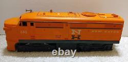 Early 1960s Lionel Diesel Locomotive, Train Cars and Accessories