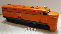 Early 1960s Lionel Diesel Locomotive, Train Cars and Accessories