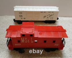 Early 1960s Lionel Diesel Locomotive, Train Cars and Accessories