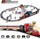 Electric Train Set With Steam Locomotive, Cars, And Railway Tracks