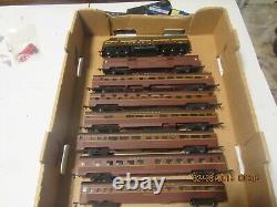 HO Scale PRR passenger train. Proto 2000 E8/9 + 7 Con Cor passenger cars