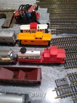 Huge Lot 72 pieces Tyco Lionel Trains Locomotive Track cars transformers & more