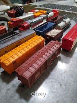 Huge Lot 72 pieces Tyco Lionel Trains Locomotive Track cars transformers & more