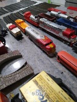 Huge Lot 72 pieces Tyco Lionel Trains Locomotive Track cars transformers & more