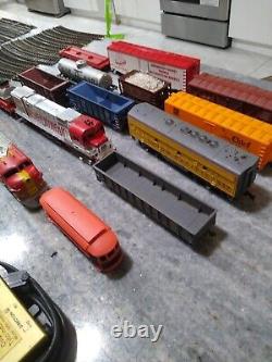 Huge Lot 72 pieces Tyco Lionel Trains Locomotive Track cars transformers & more