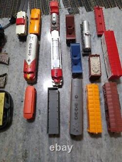 Huge Lot 72 pieces Tyco Lionel Trains Locomotive Track cars transformers & more