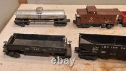 Lionel 675 locomotive 3469 dump car 6555, 6462, 6411, 6466, 6457 O Gauge Trains