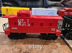 Lionel O Gauge Minneapolis & St. Louis Train. Engine, B Unit, And 5 Cars