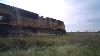 Union Pacific Train With Hopper Cars Traveling Through Elkhart Iowa