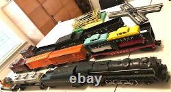 Vintage Lionel Trains Post-War Lot withBrick Boxes, 681 Locomotive, 13 Cars, 1950s